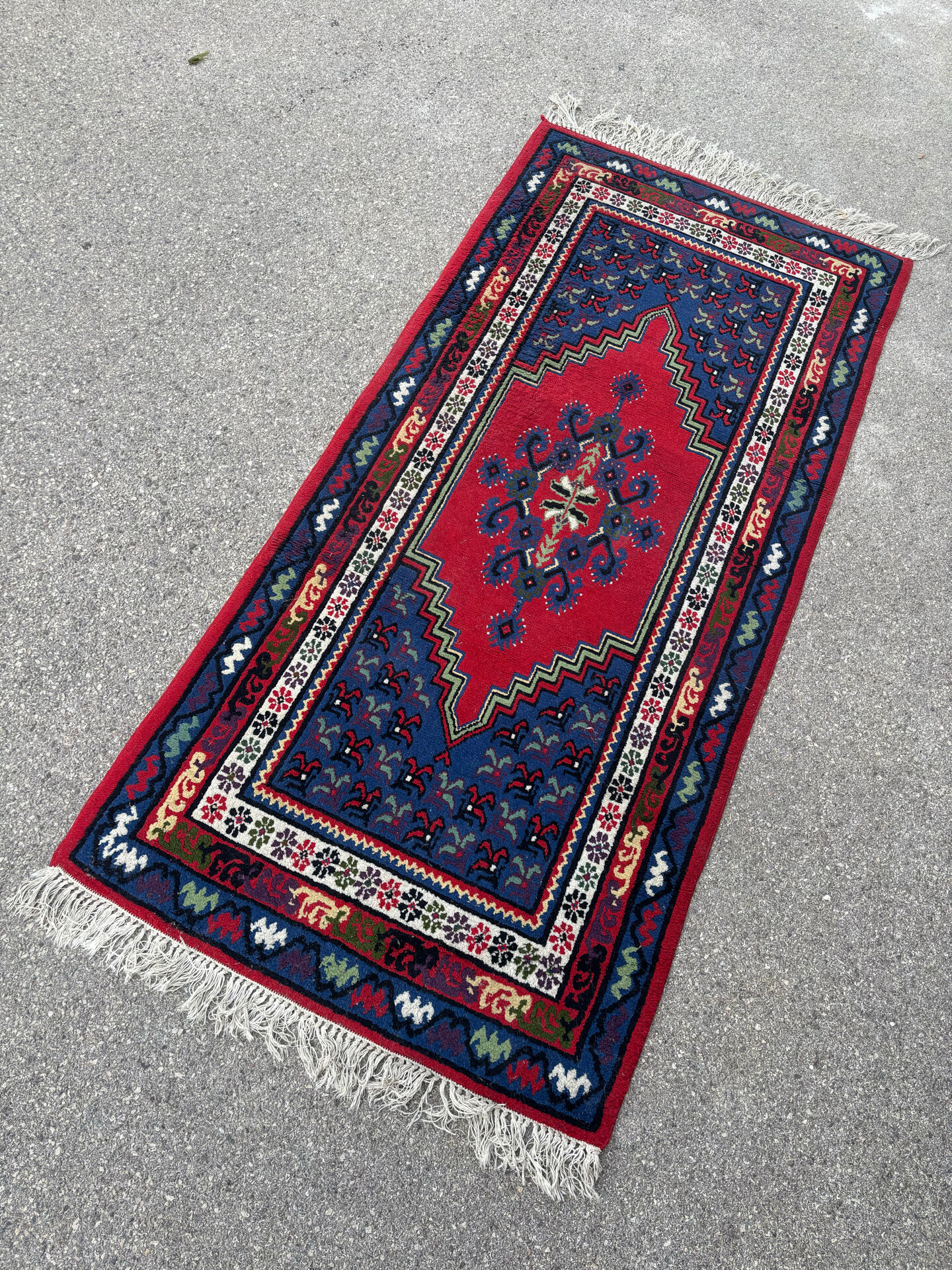 Handwoven wool oriental rug – 220 × 100 cm