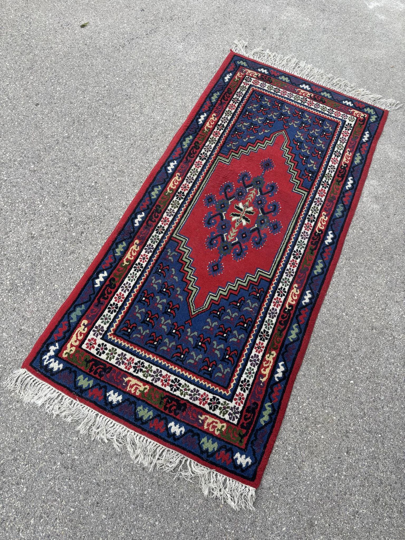 Handwoven wool oriental rug – 220 × 100 cm