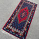 Handwoven wool oriental rug – 220 × 100 cm