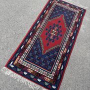 Handwoven wool oriental rug – 220 × 100 cm