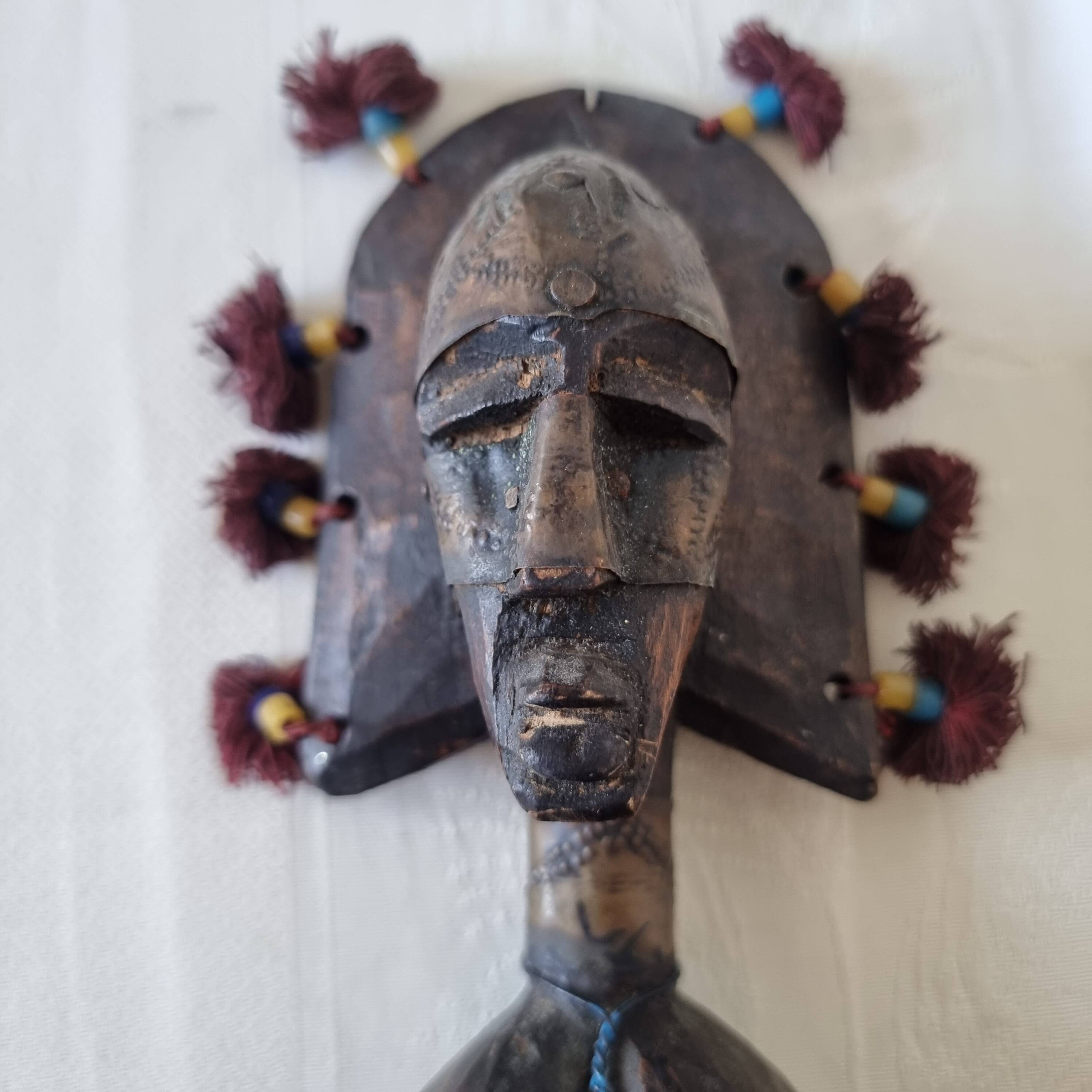 Scepter decorated with a female figure in wood and brass