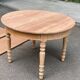 Round extendable dining table stripped in solid cherry wood France 1950