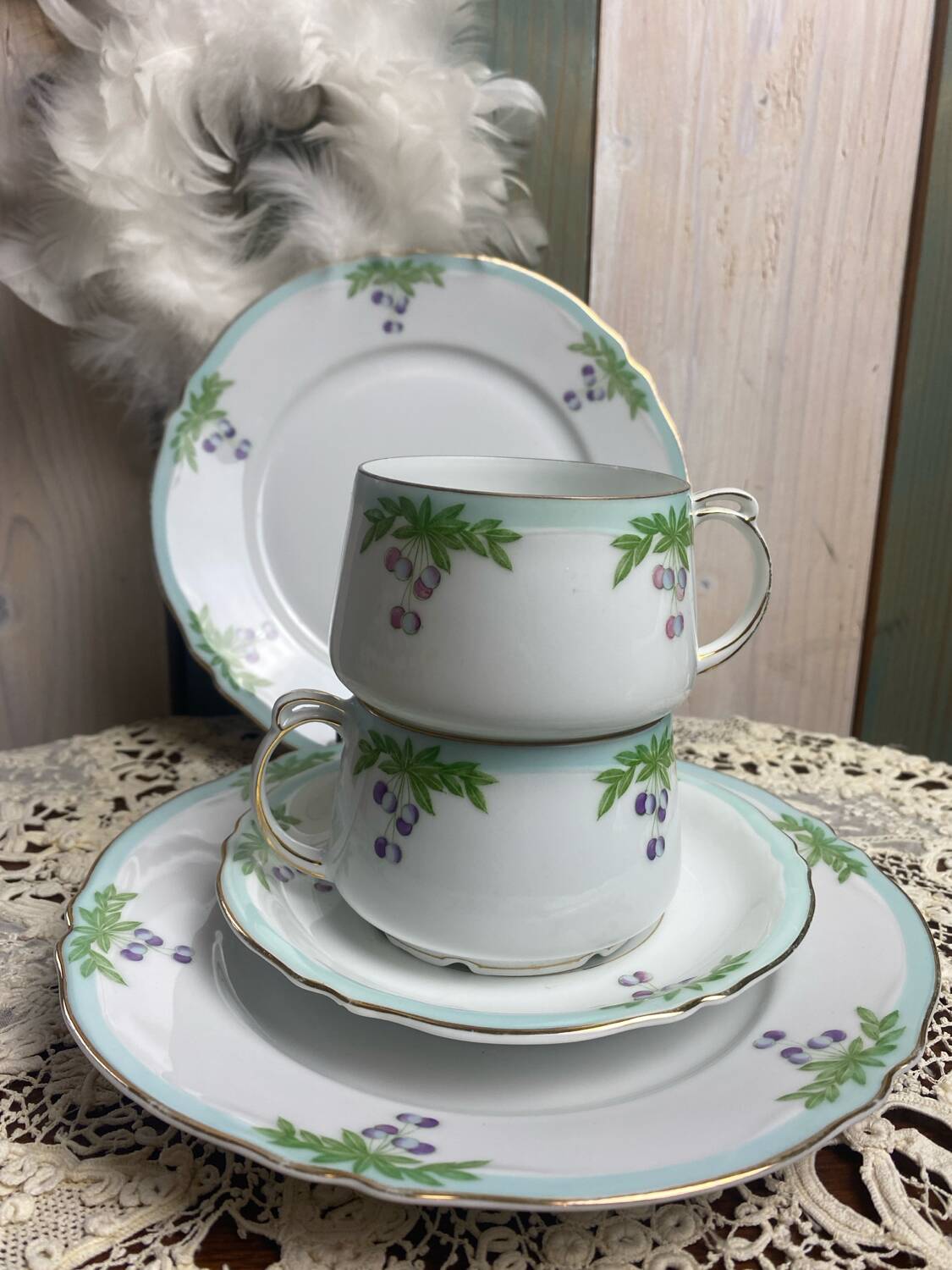 Set of 2 antique porcelain chocolate services.