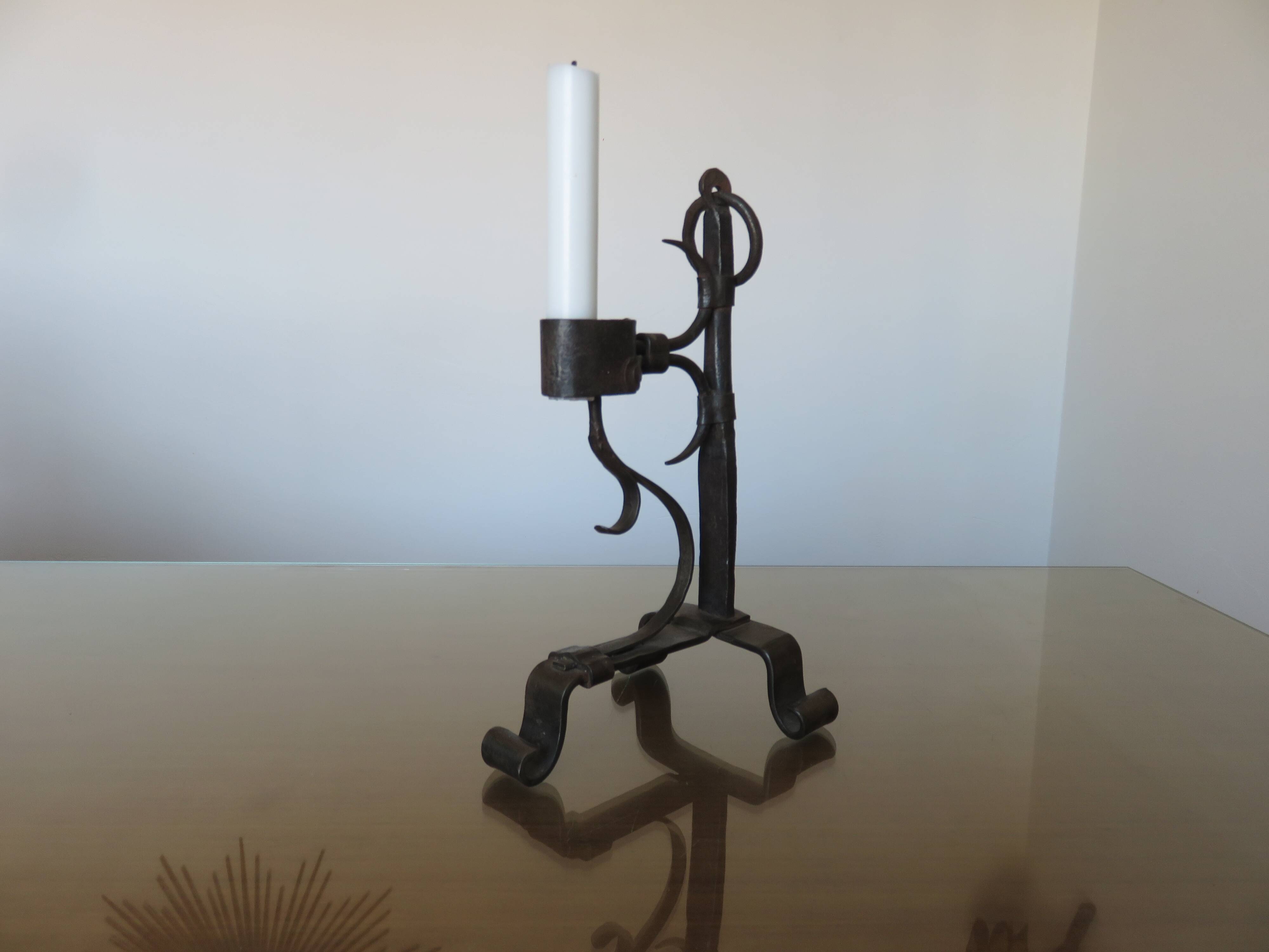 Brutalist candlestick in blackened wrought iron from the 1940s-50s.