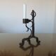 Brutalist candlestick in blackened wrought iron from the 1940s-50s.