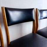 Set of 4 wooden and black leatherette chairs