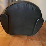 Green leather club chairs