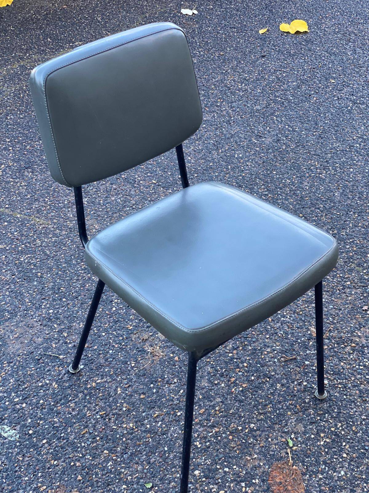 Vintage steel and dark green leather chair from the 60s