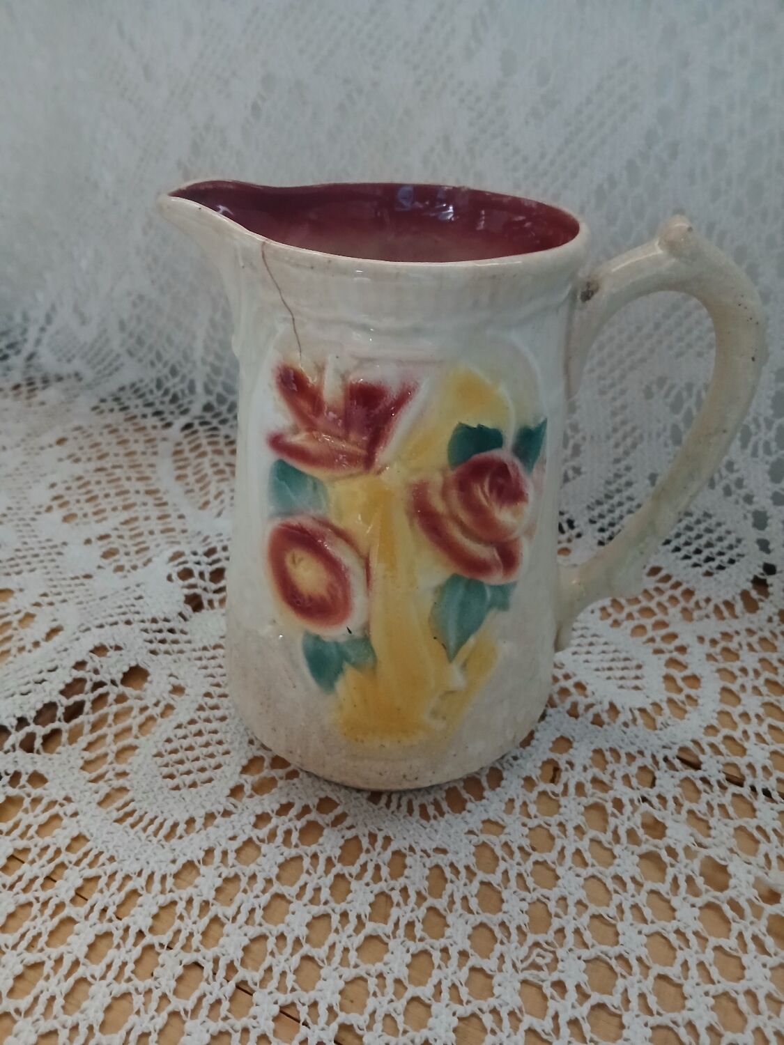 Antique earthenware pitcher