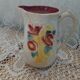 Antique earthenware pitcher