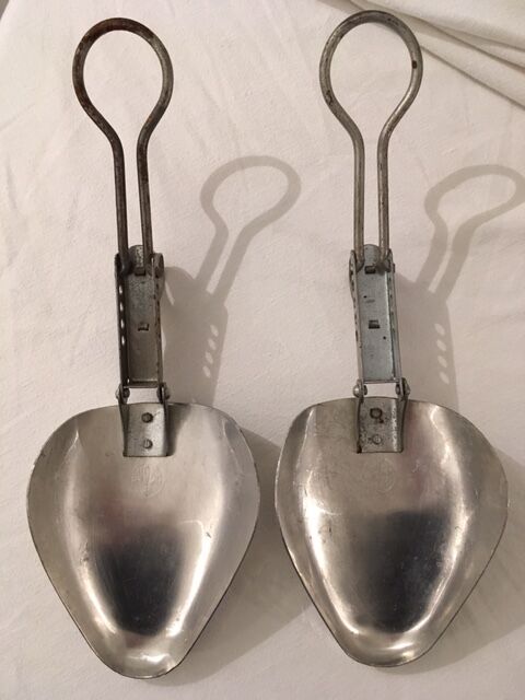 Shoe trees above  aluminium