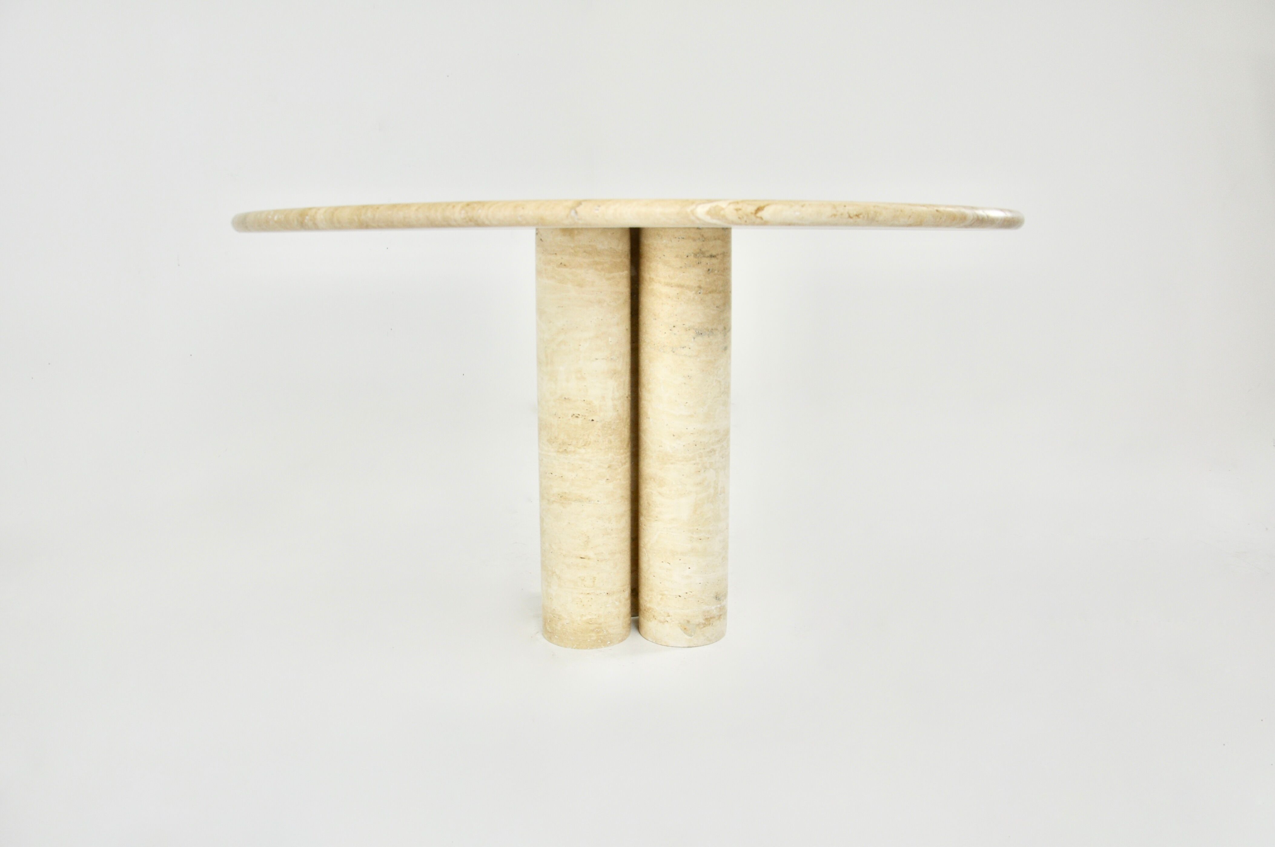 Circular travertine dining table