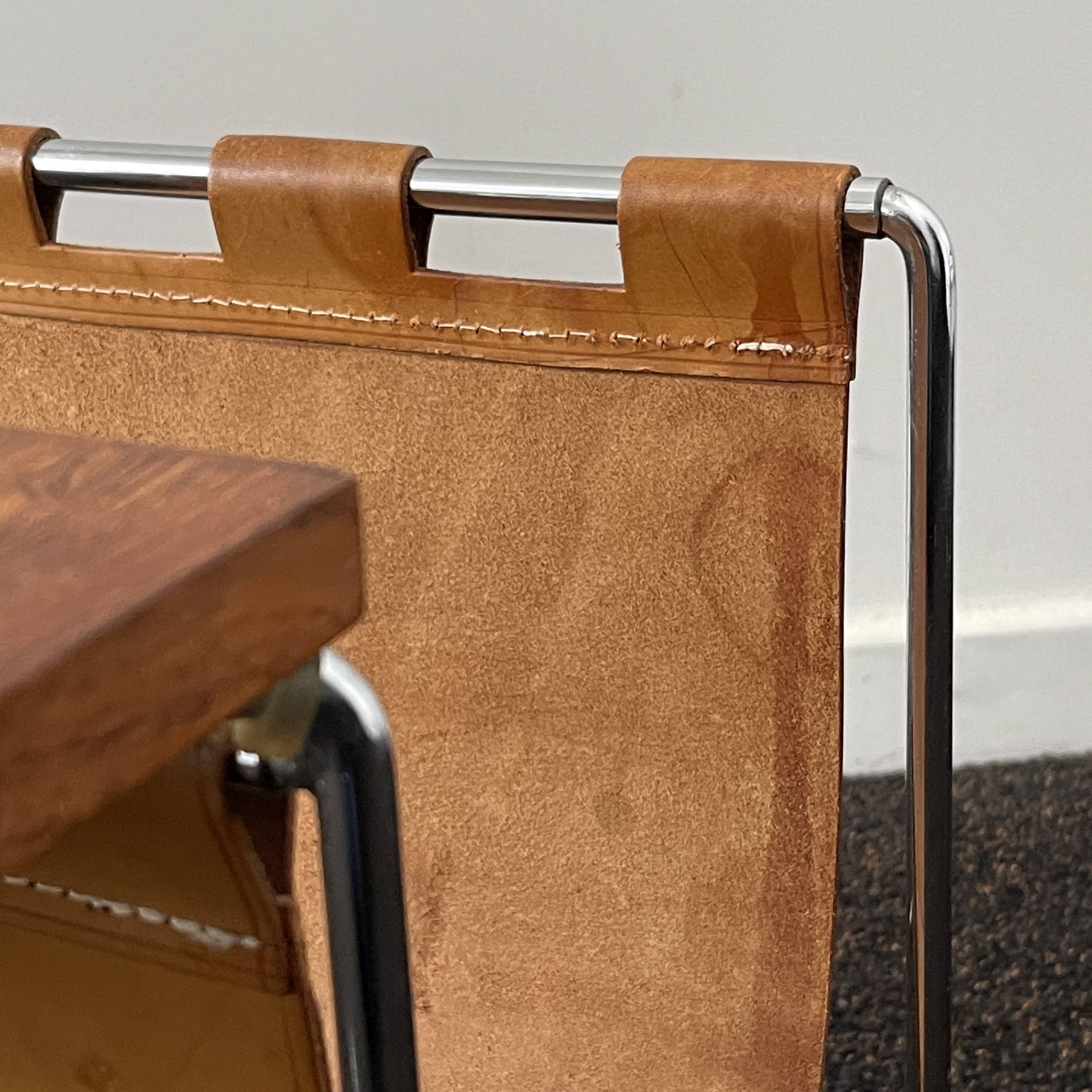 Vintage side table / newspaper holder in leather, chrome-plated steel rosewood, ca 1970