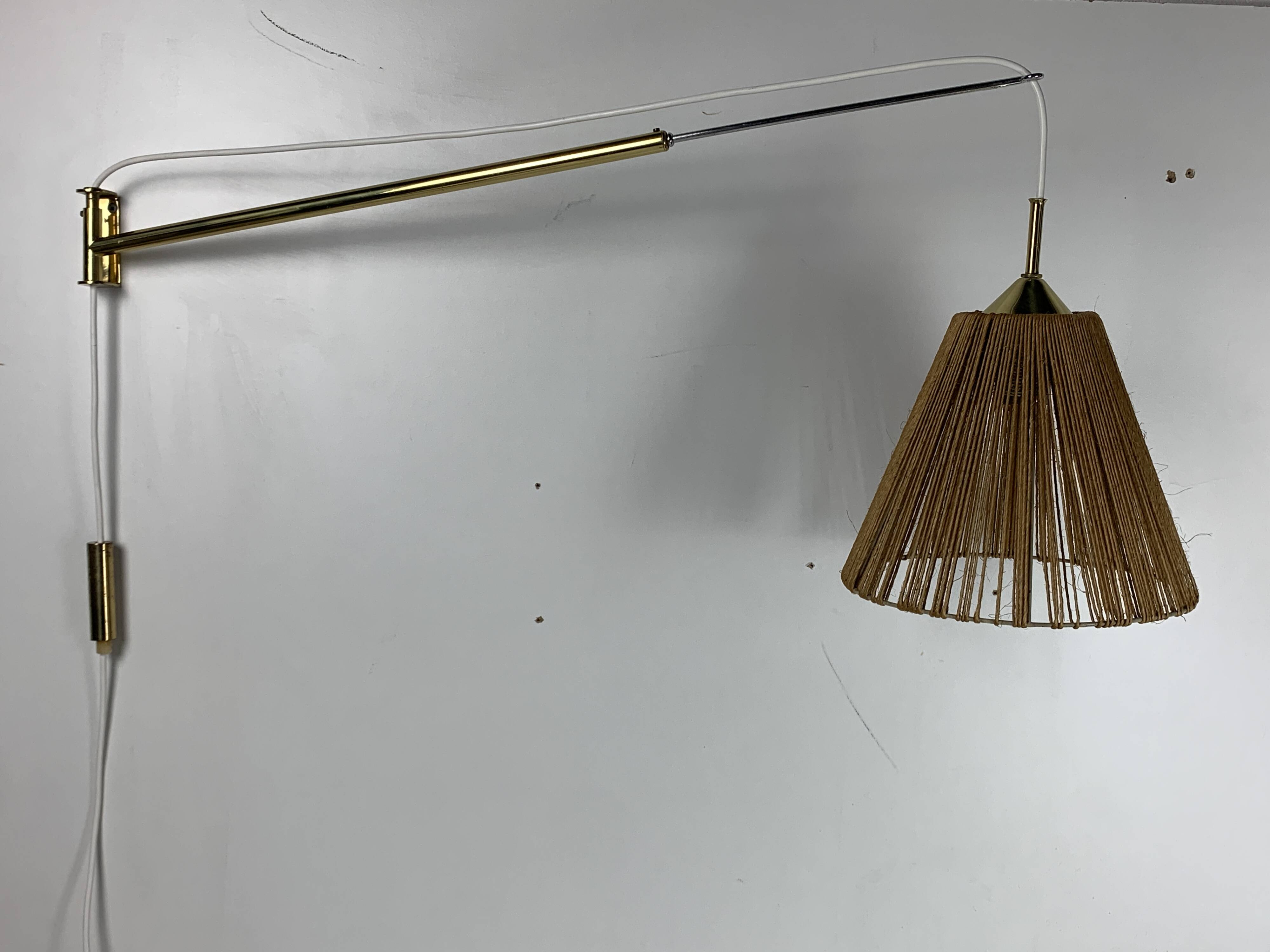 Midcentury extendable brass wall mount with cocoon and sisal shade Lars Schioler, 1960s