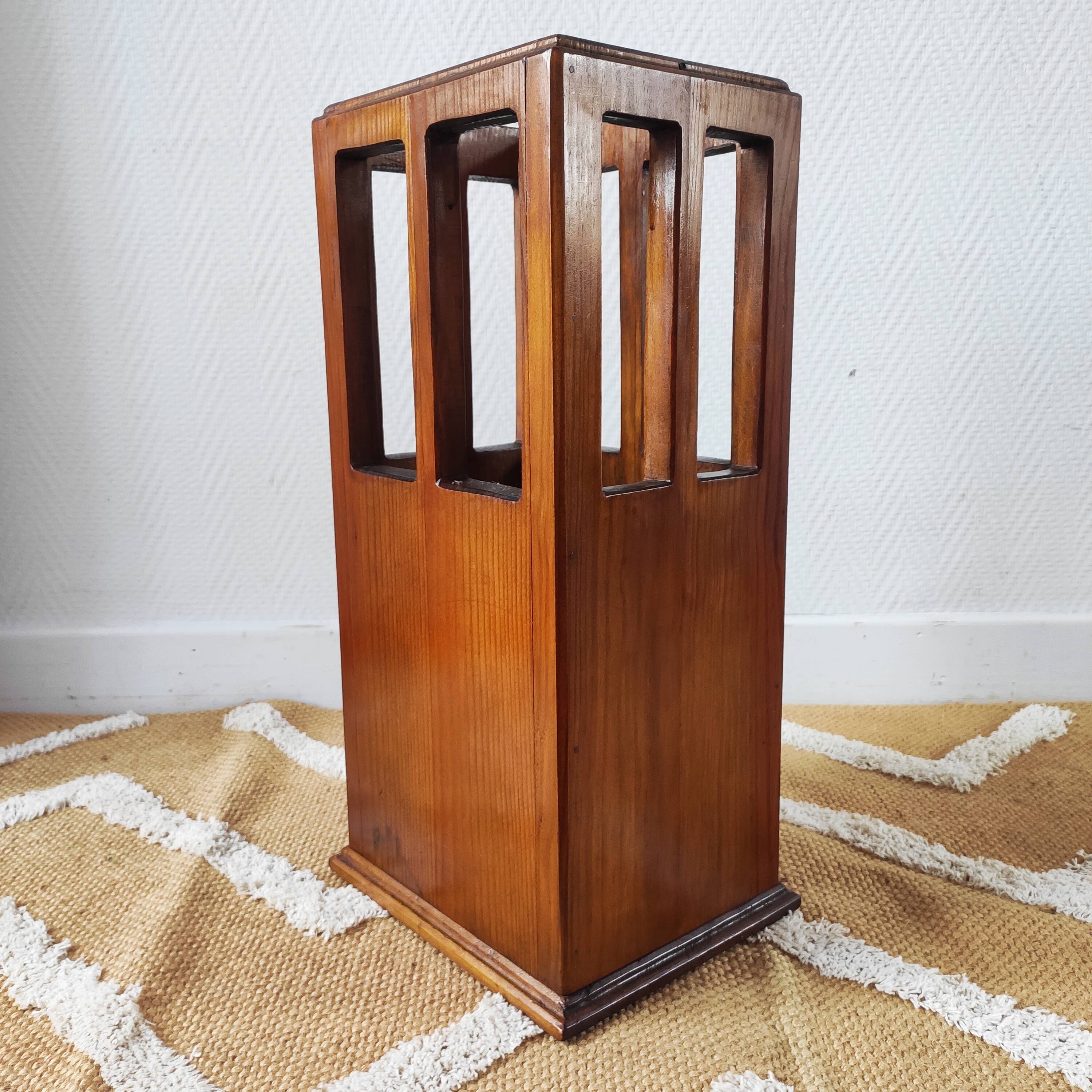 Vintage brutalist umbrella stand made of solid wood.