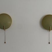 Pair of green plexiglass and gold metal wall lights by Erco, 1950s, Germany.