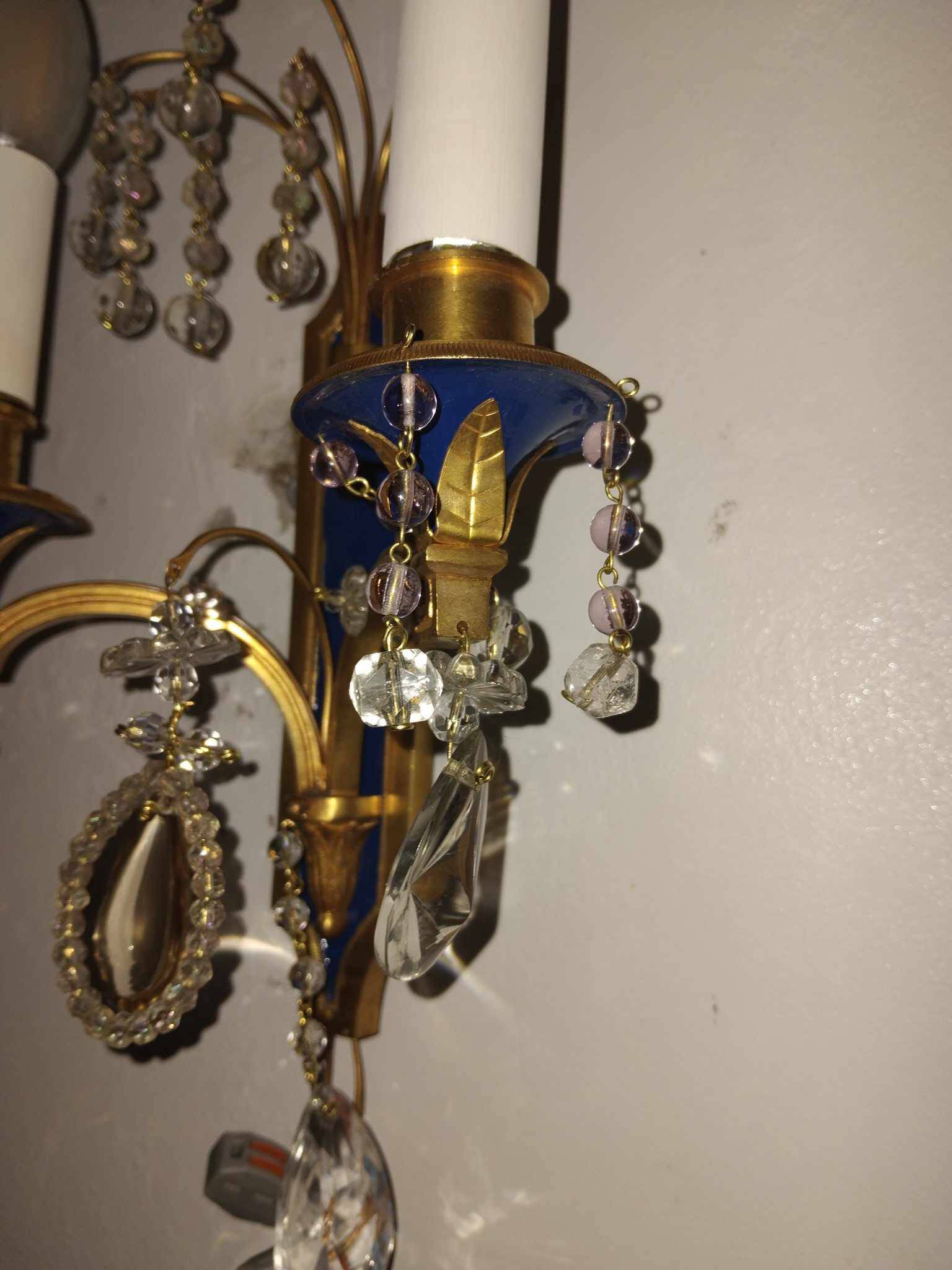 Pair of Louis XVI style gilt bronze wall lights