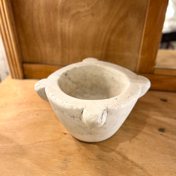 Old white grey marble mortar