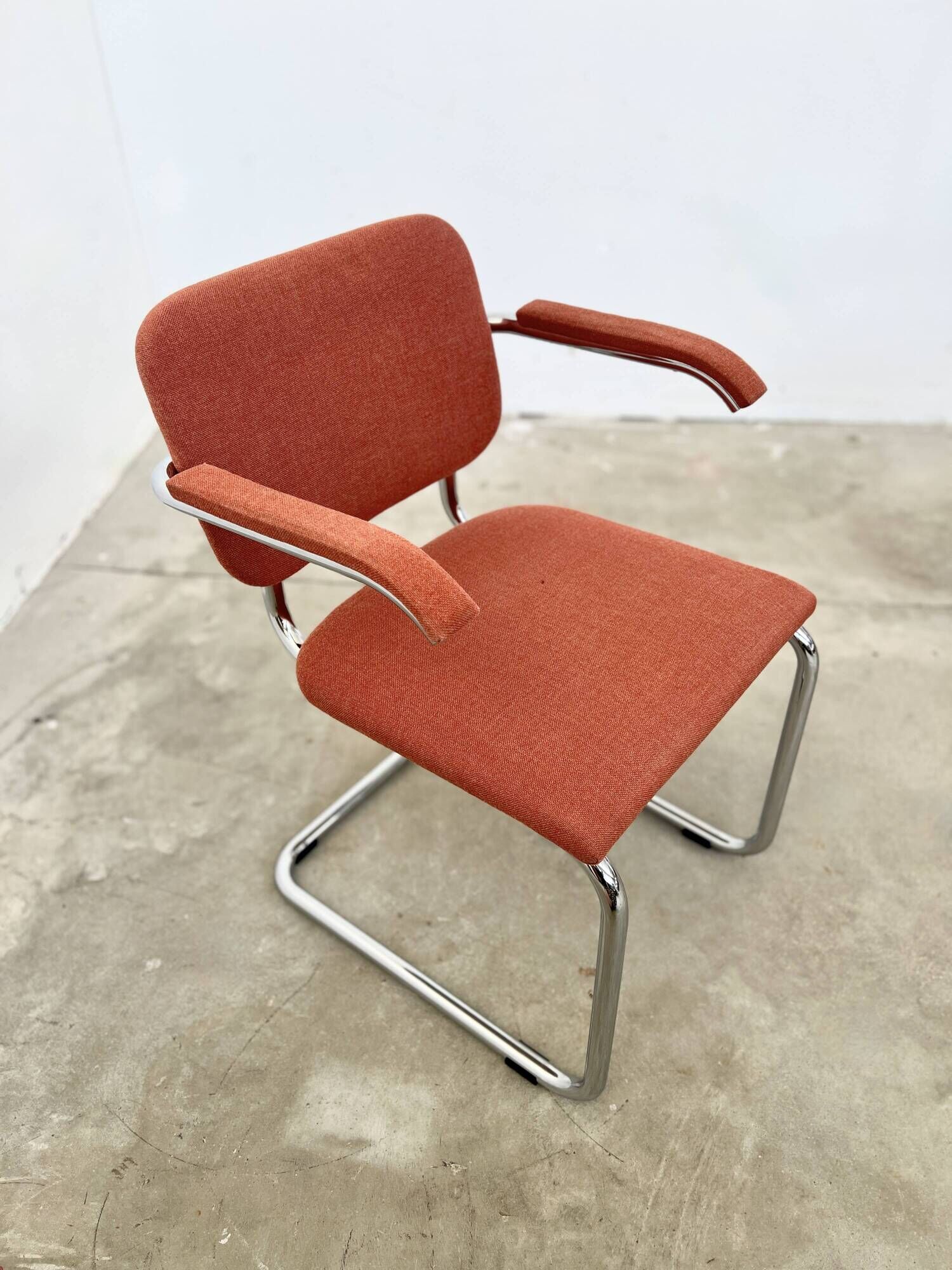Pair of Marcel Breuer B64 Knoll armchairs in coral fabric