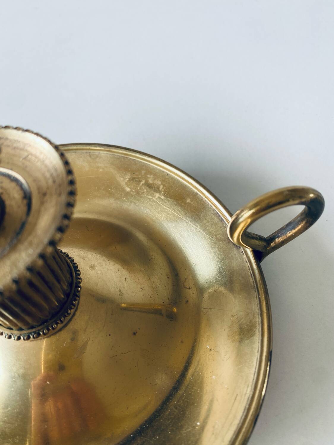 Candle holder with brass handle