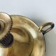 Candle holder with brass handle