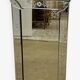 Venetian mirror with floral decoration pediment