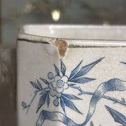 Old faience sugar bowl base with a patinated blue floral pattern from Digoin.