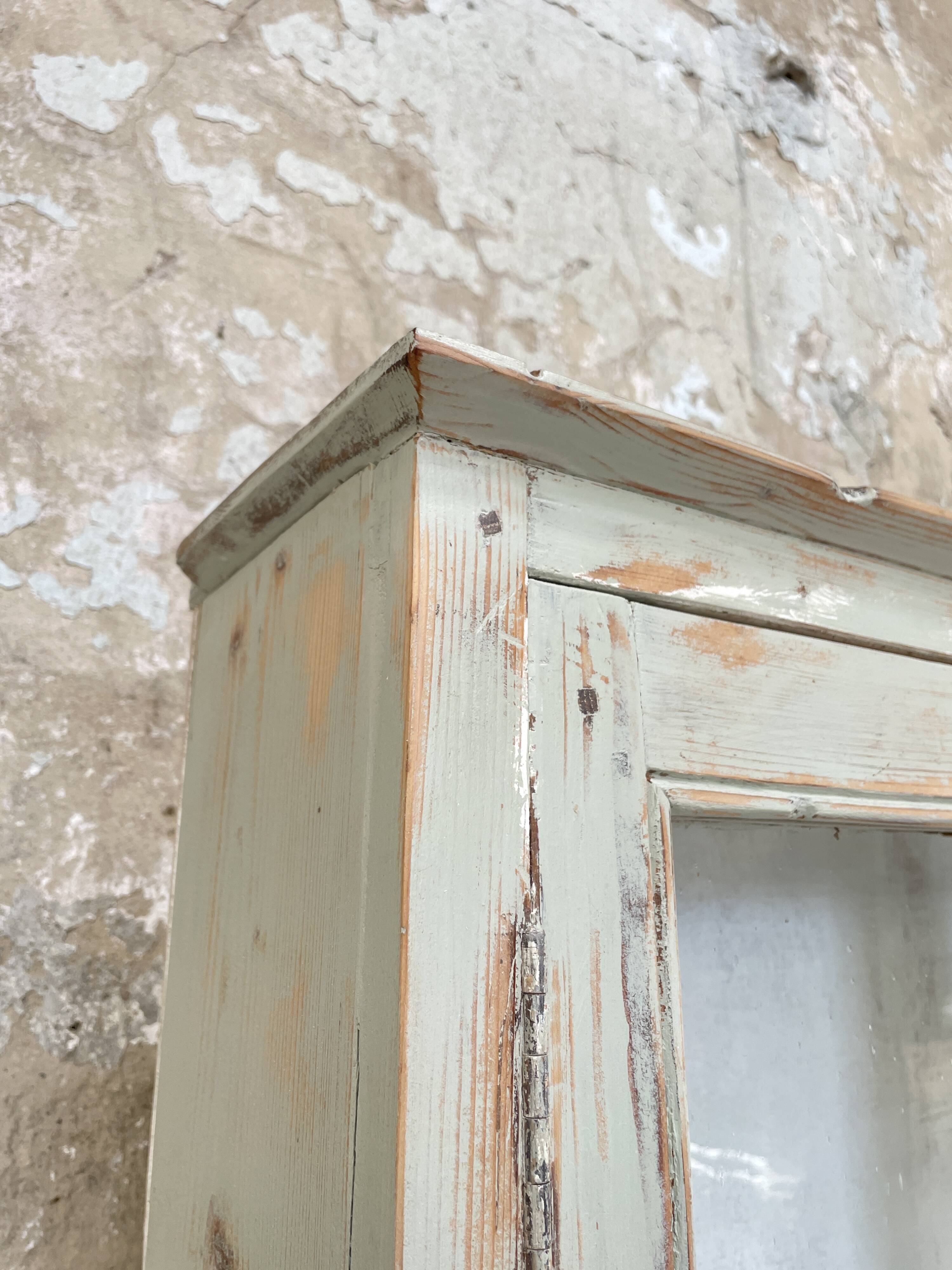 Furniture two body showcase, around 1900.