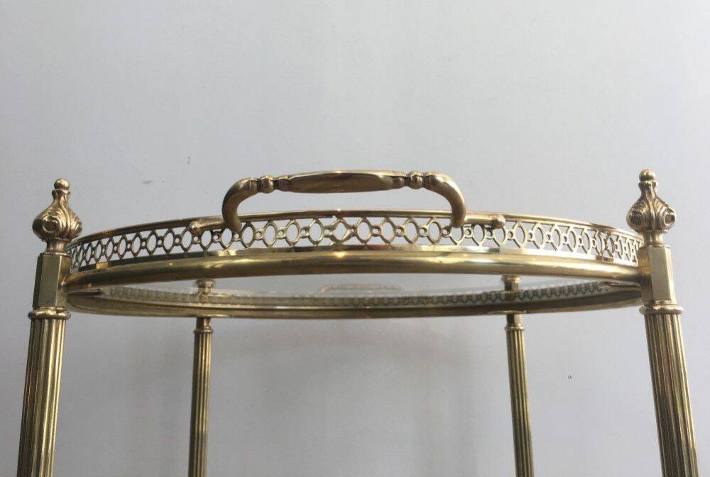 Round brass rolling table attributed to Maison Jansen