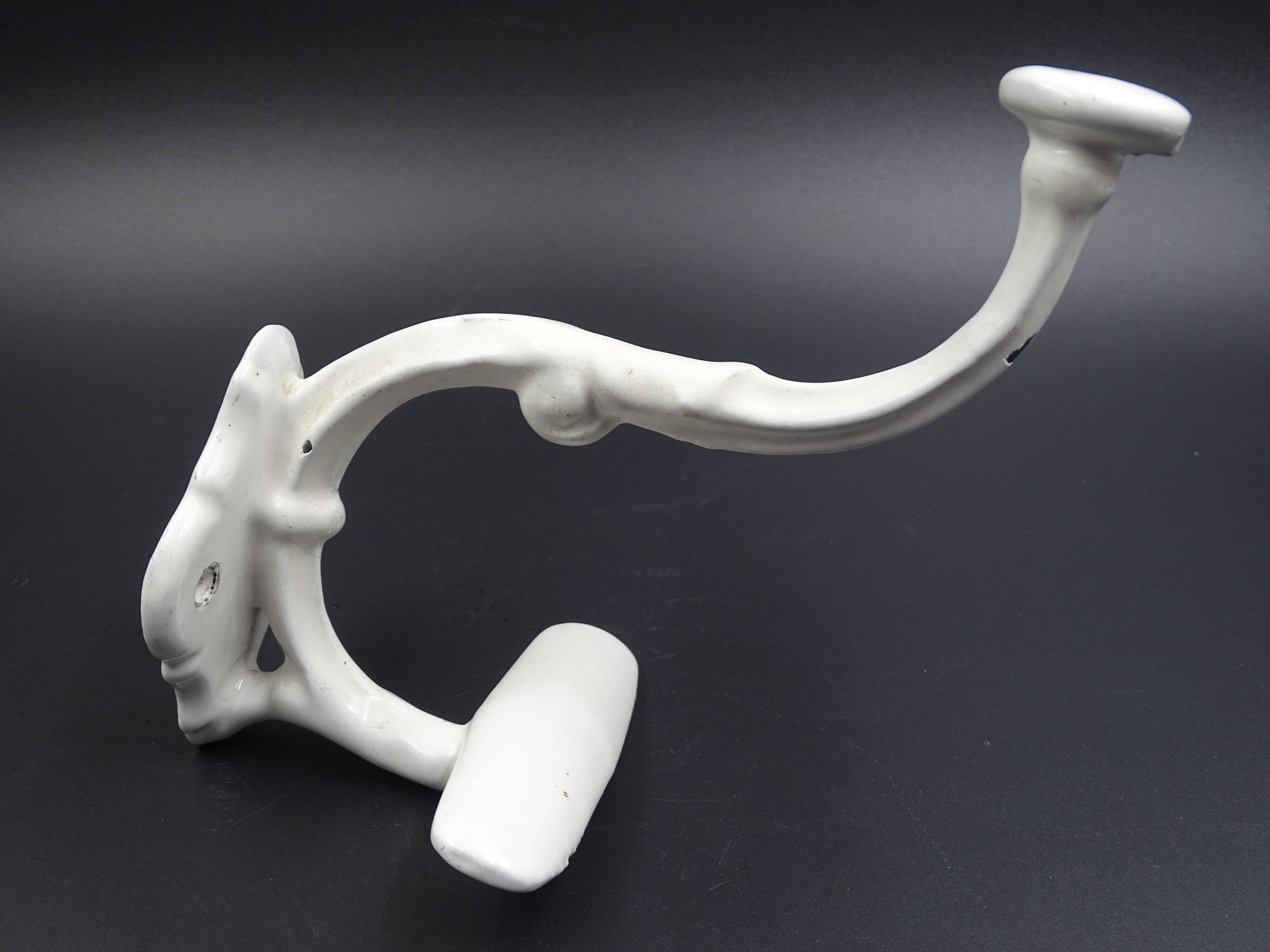 Old white enamelled metal patère