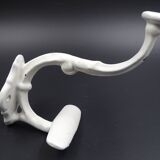 Old white enamelled metal patère