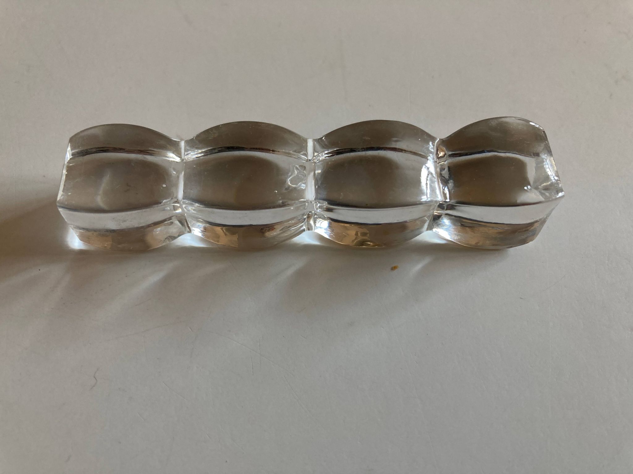 Set of 8 modernist crystal knife rests from the 1940s.