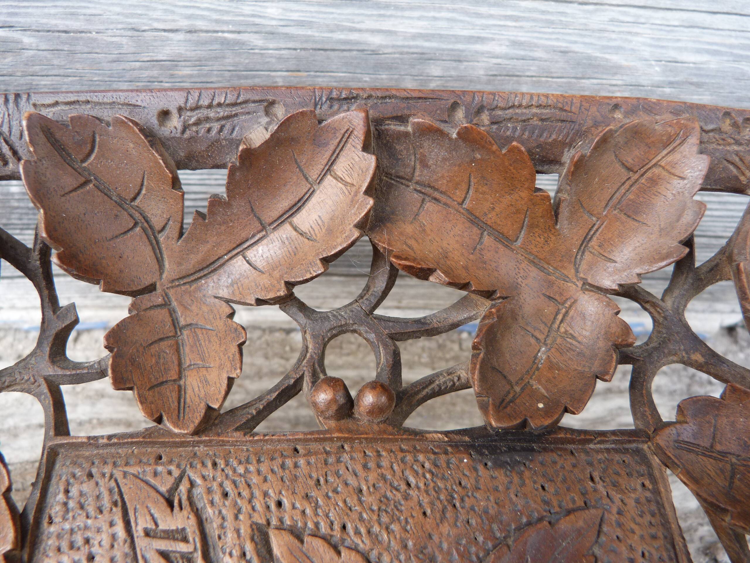 Small wooden tray cut out with leaf patterns