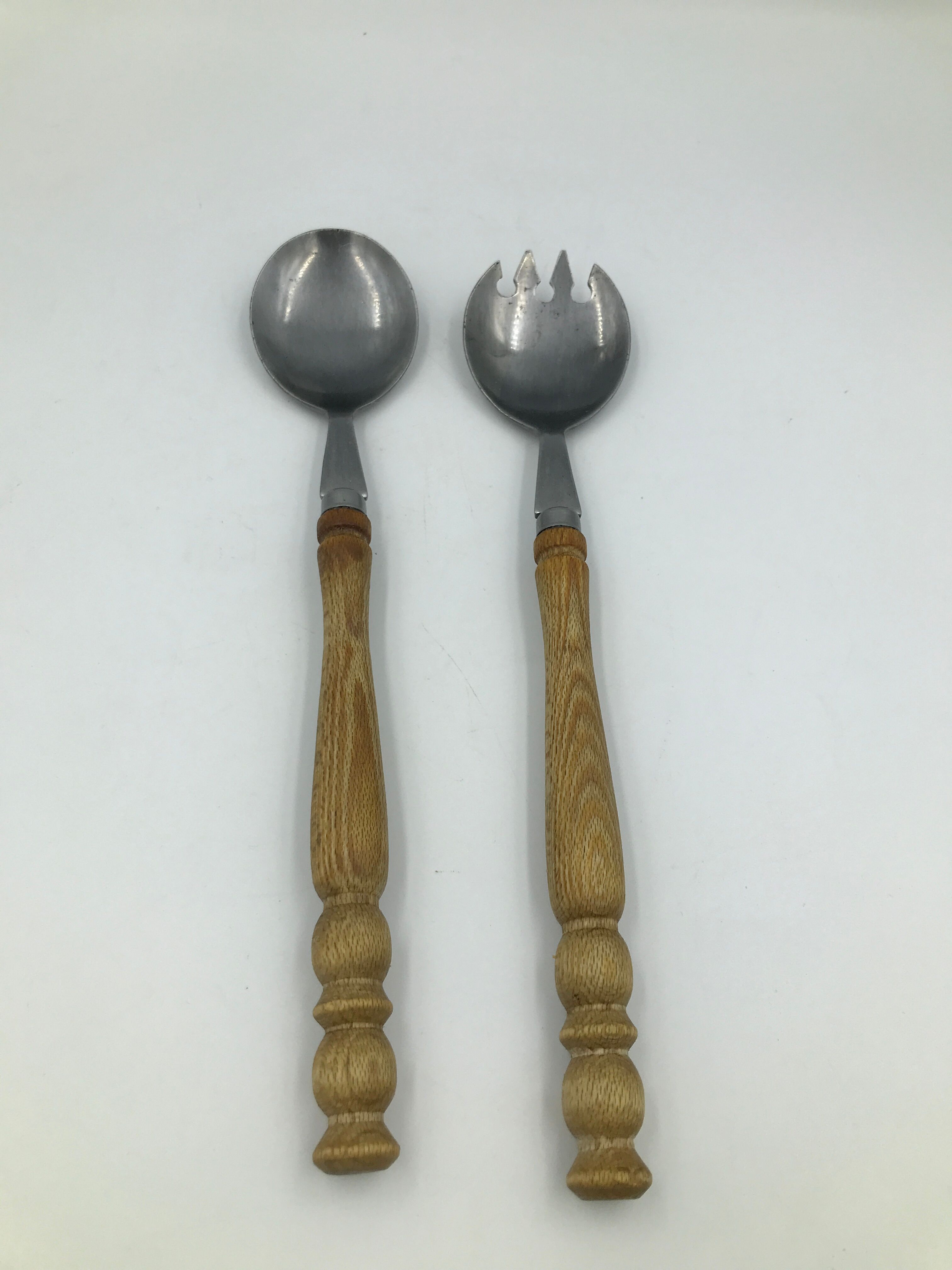 Old vintage wooden salad cutlery