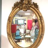 Miroir ovale en bois doré 98x63 cm