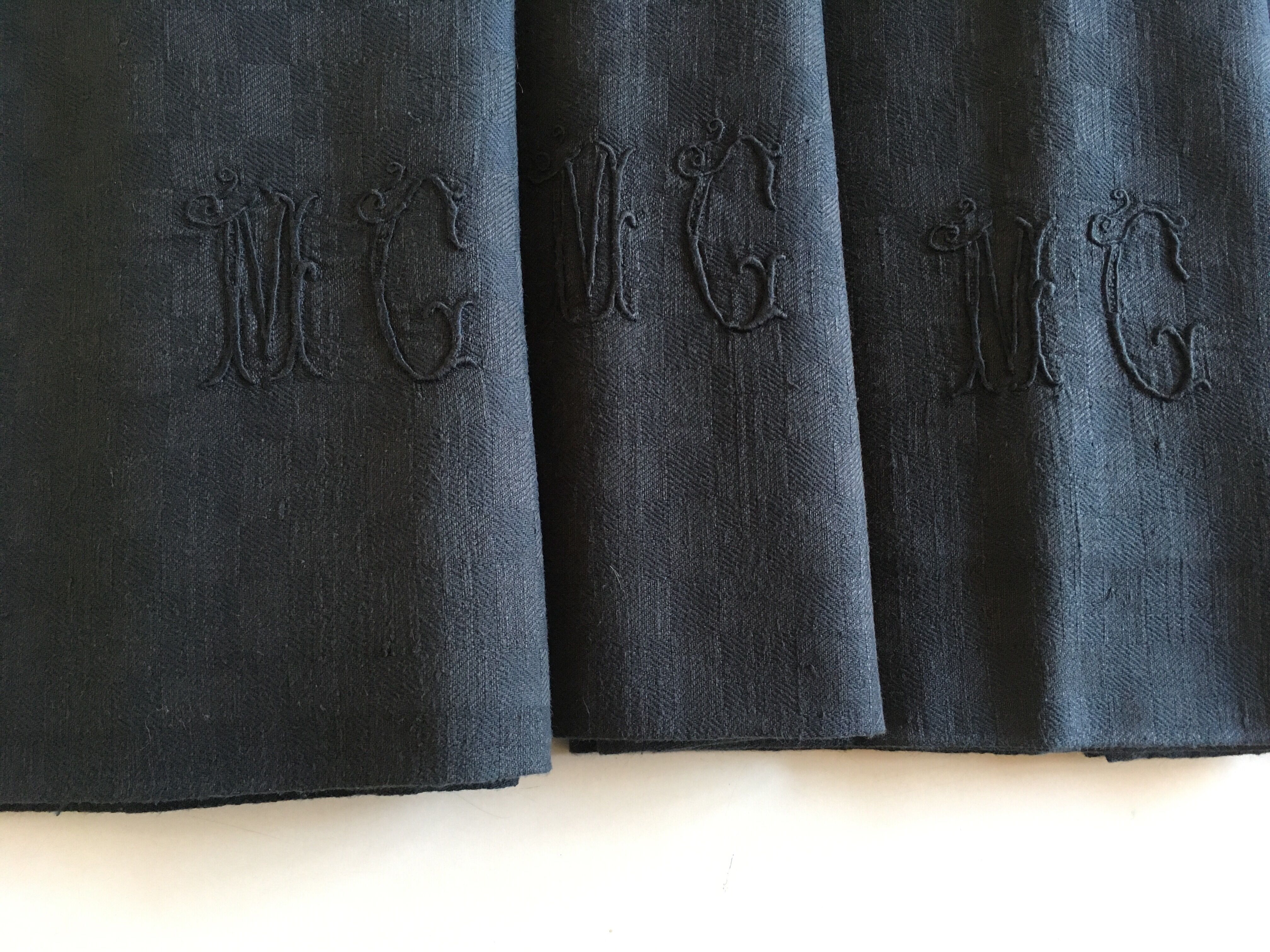 Set of 4 old black damask towels embroidered monogram MC, circa 1920