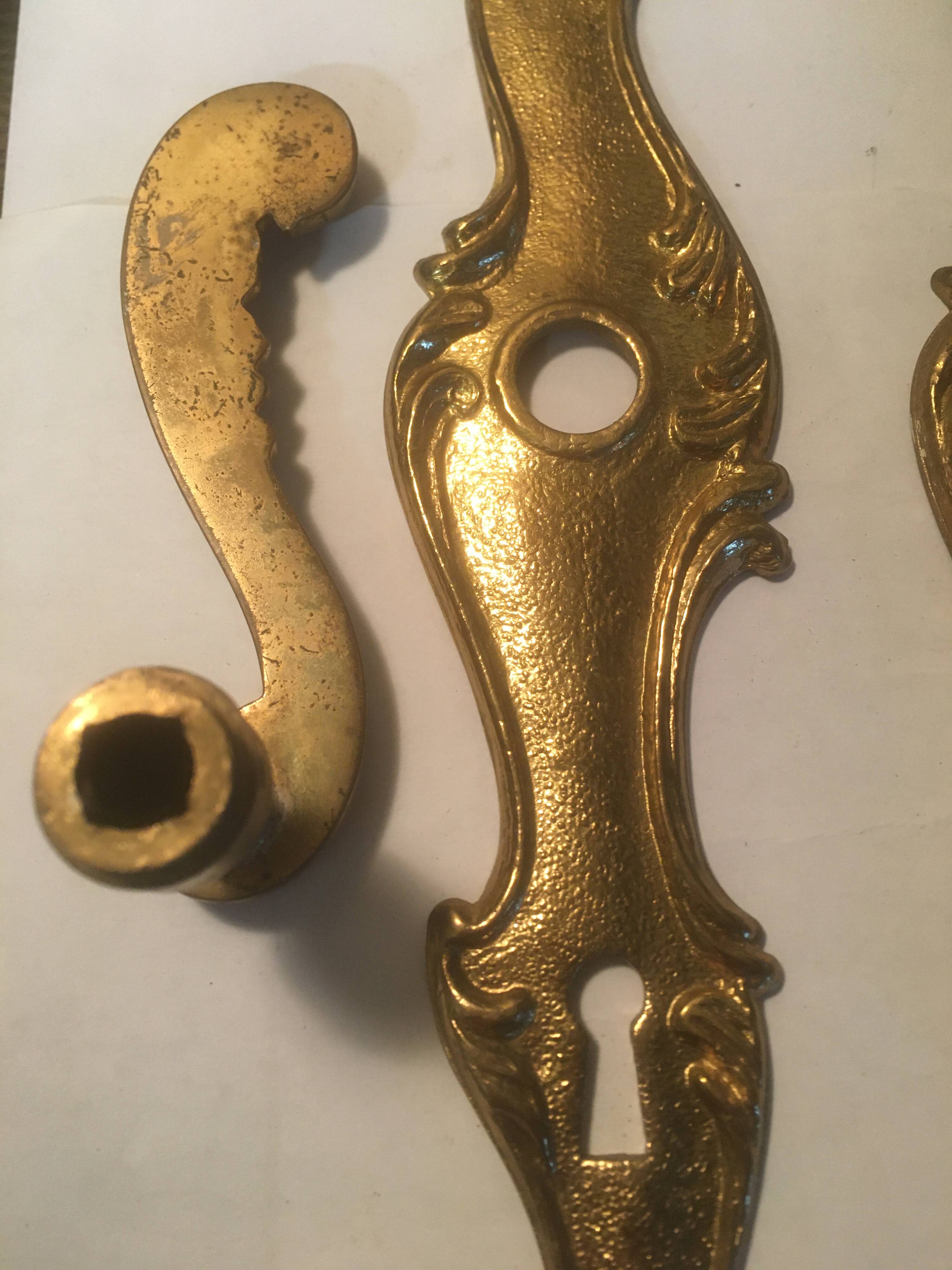Louis xv style brass crutches and plaques