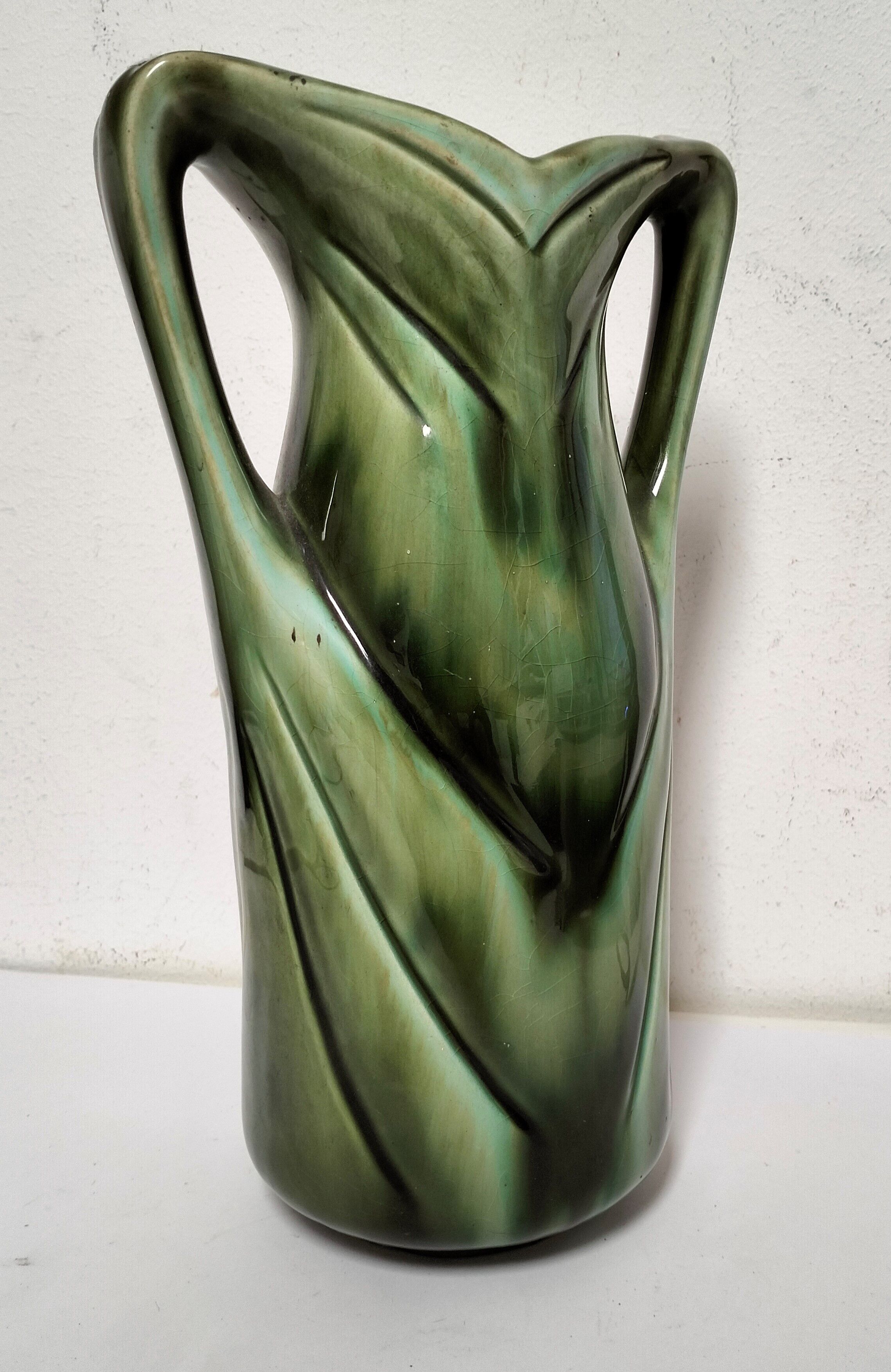 Old art nouveau earthenware slip vase