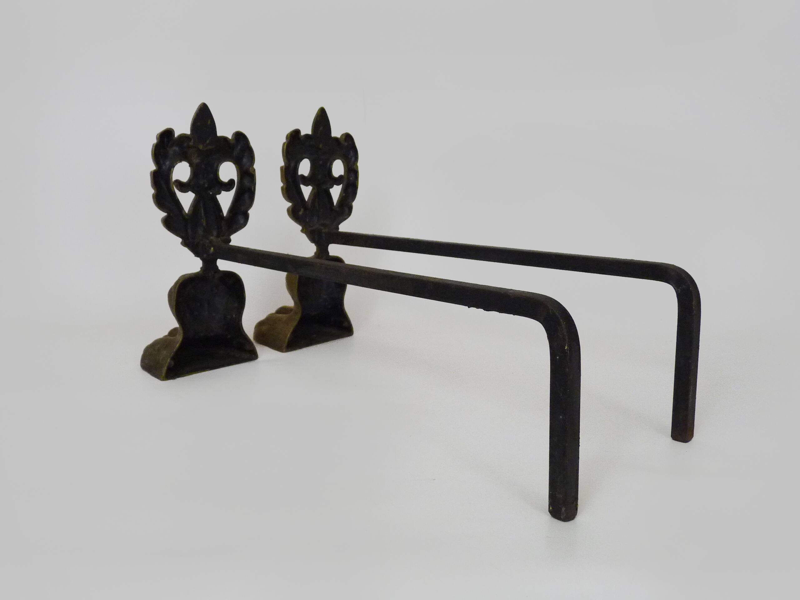 Pair of bronze fire dogs with lion paws. Early 20th century.