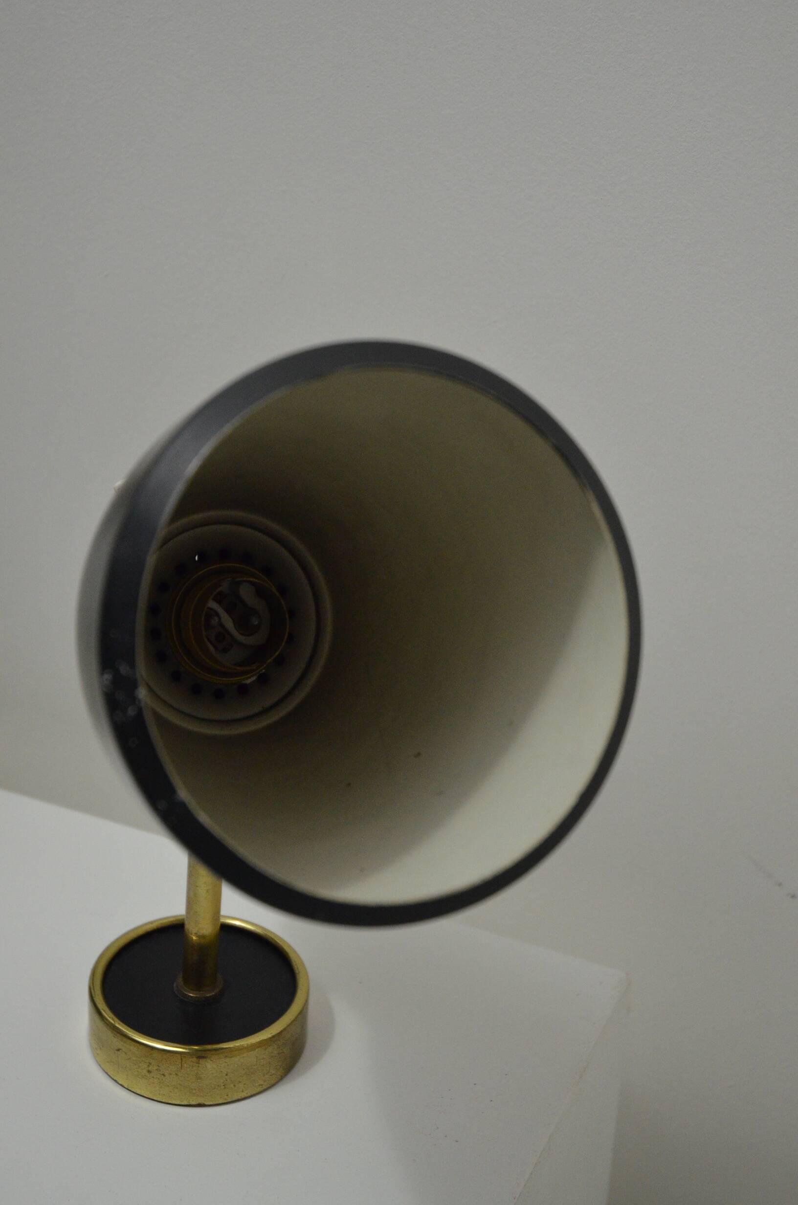 Pair of Monix wall lights in black lacquered metal and brass
