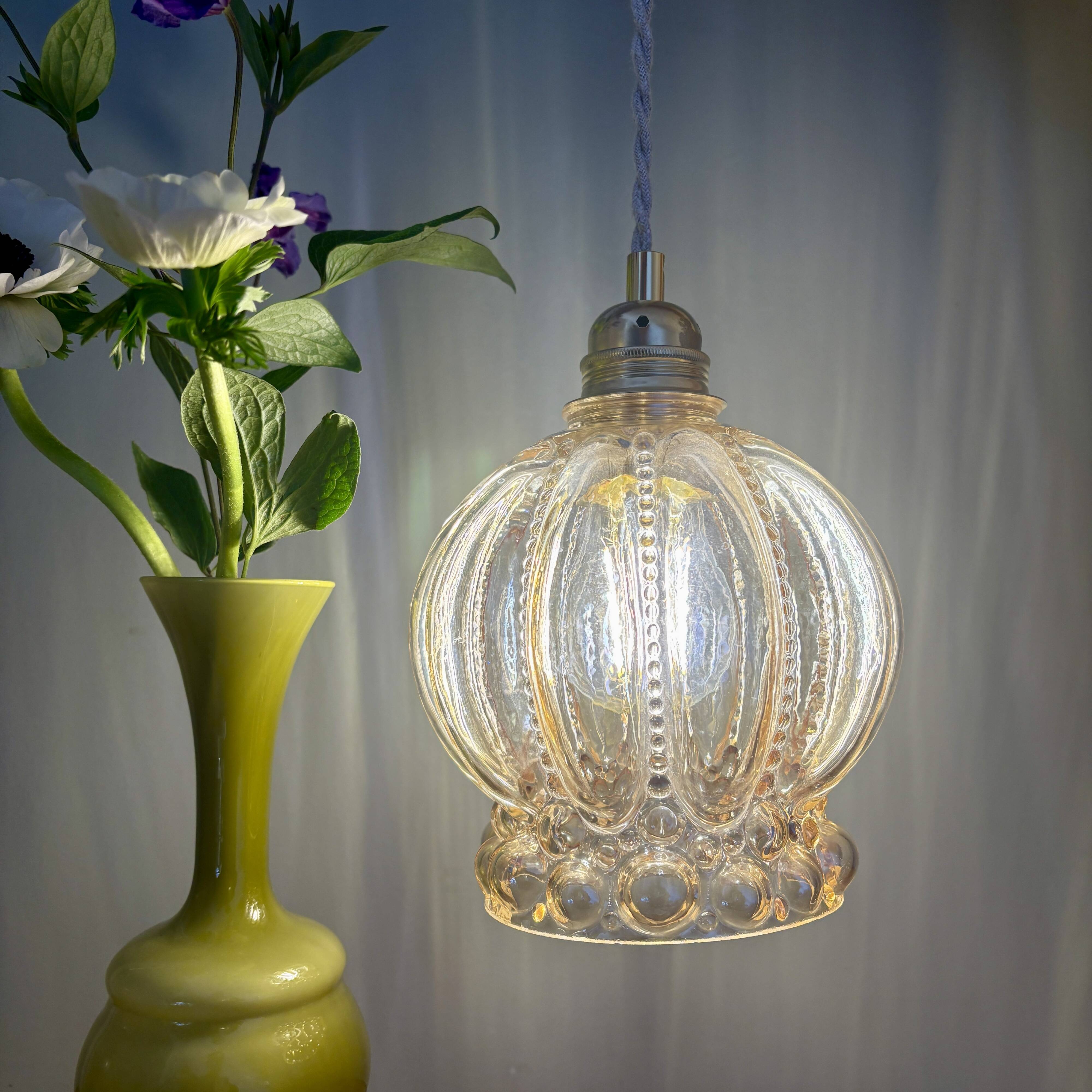 Vintage globe pendant light in amber bubble glass