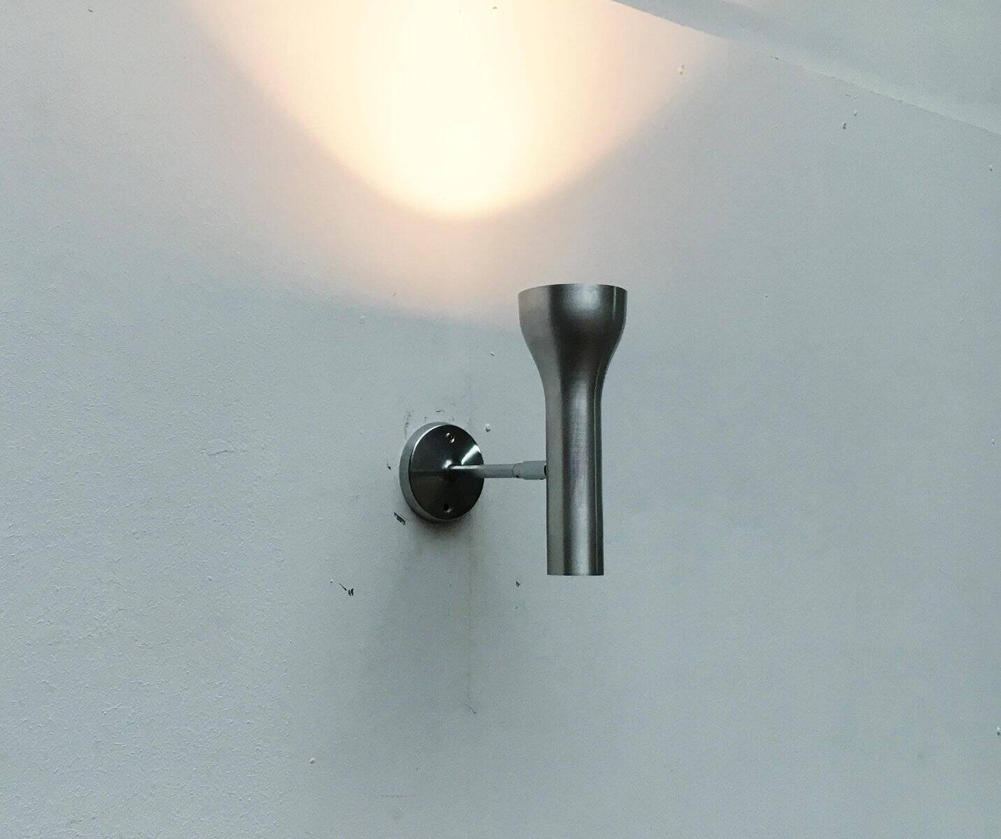 Mid-century wall sconce by the SLZ team for Swisslamps International.