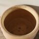 Round terracotta milk jug with handle