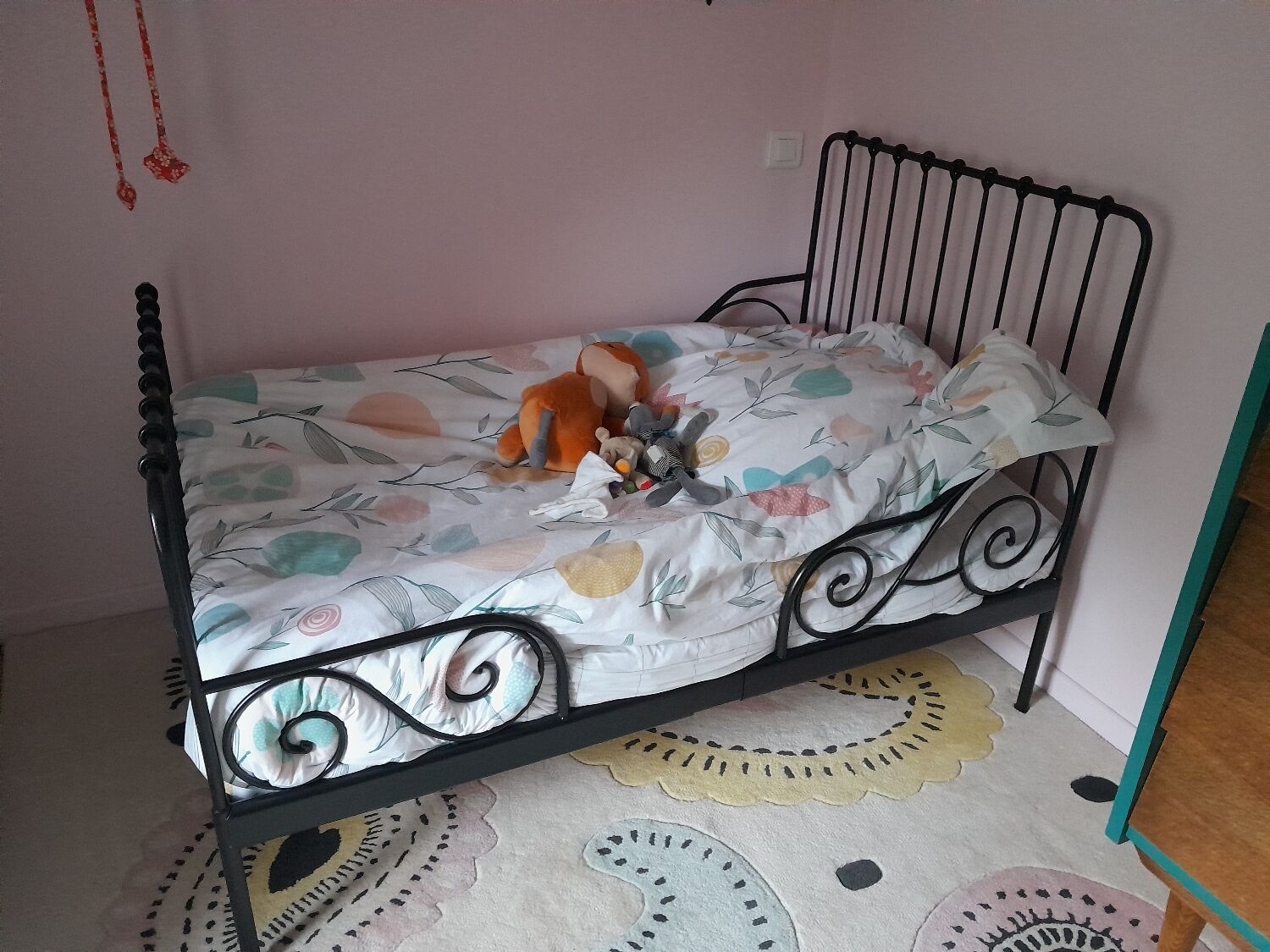 Scalable wrought iron bed with mattress