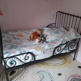 Scalable wrought iron bed with mattress