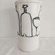 Vase with a relief design of bottles and glasses