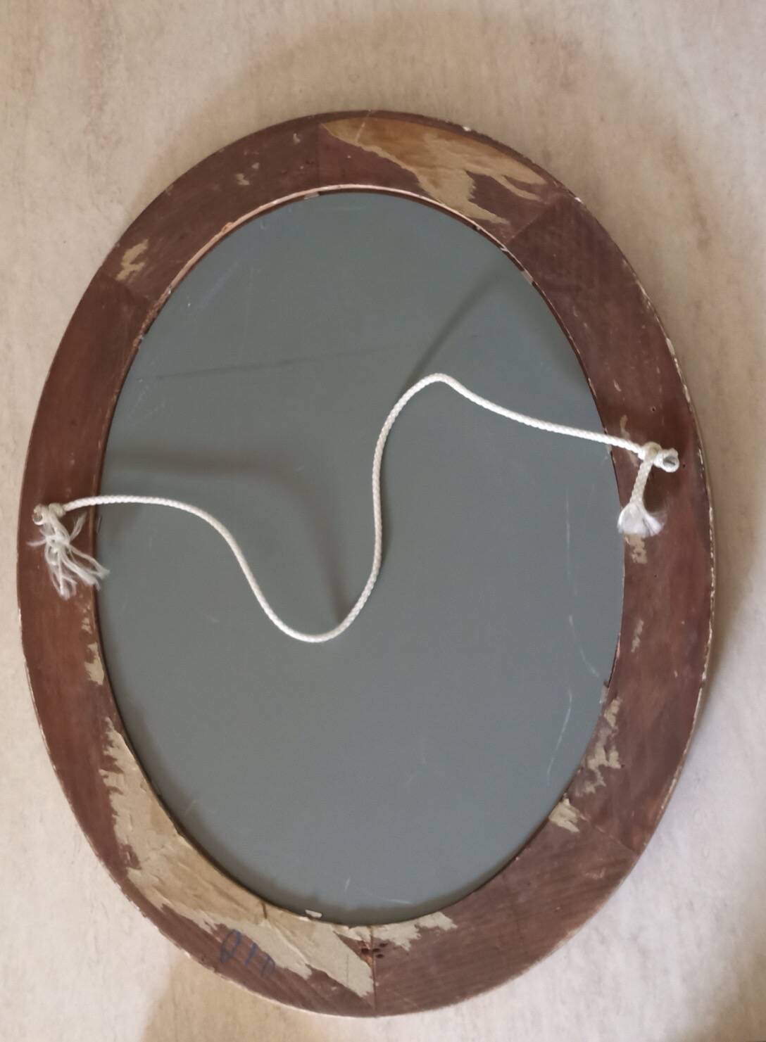 Modern oval mirror with flower decoration