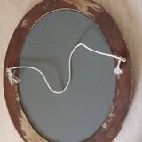 Modern oval mirror with flower decoration