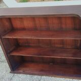 Bar counter in solid exotic teak wood; molded panel decor.