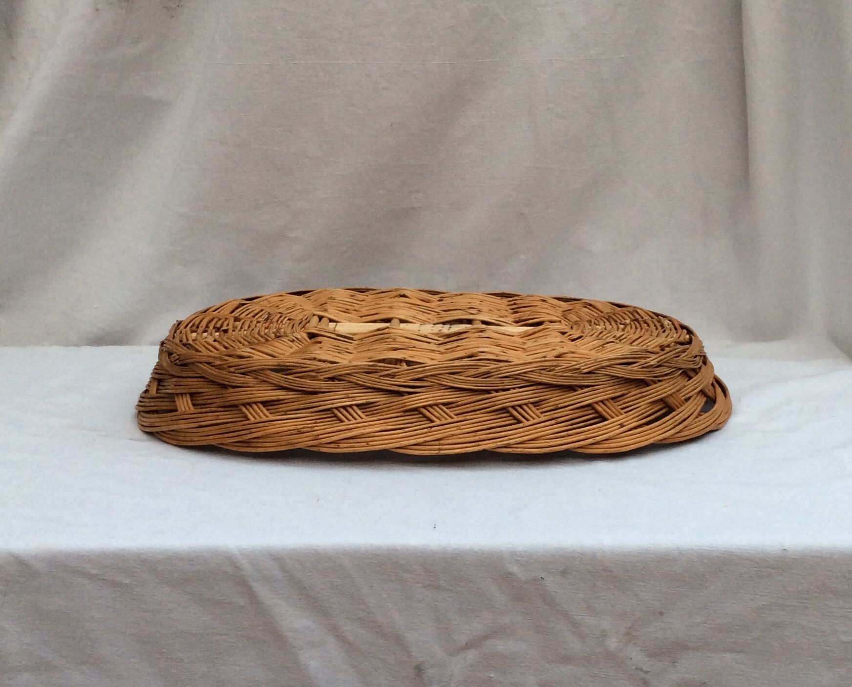 Vintage oval-shaped wicker basket